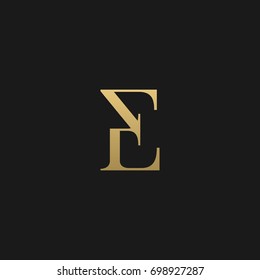 Modern unique stylish elegant luxurious fashion brands black and gold color E initial based letter icon logo.