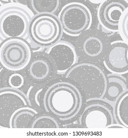 Modern vector abstract seamless geometric pattern with  circles in retro scandinavian style. Neutral gray and white colored shapes with worn out texture.