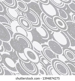 Modern vector abstract seamless geometric pattern with  circles in retro scandinavian style. Neutral gray and white colored shapes with worn out texture.