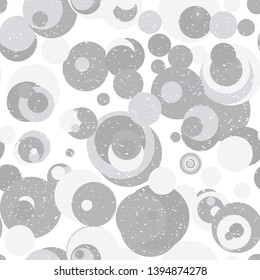Modern vector abstract seamless geometric pattern with  circles in retro scandinavian style. Neutral gray and white colored shapes with worn out texture.