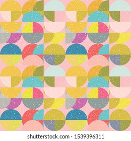 Modern vector abstract seamless geometric pattern with semicircles and circles in retro scandinavian style. Pastel colored colorful shapes with worn out texture .