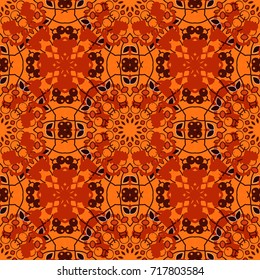 Modern vector mandalas design for print on card paper, fabric poster, carpet or book cover. Colorful tones. Abstract luxury and elegant seamless pattern in popular orange, red and brown colors.