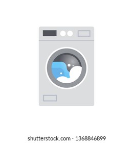 modern washing machine with dirty clothes during wash home appliance flat