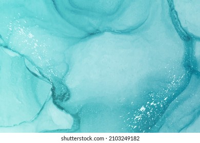 Modern watercolor background or elegant card design or wallpaper or poster with abstract blue ink waves and silver splashes.
