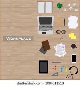 Modern wood workplace with notebook, laptop, glasses, mbile phone, plant, coffee, sheets of paper.