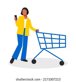 A modern young woman in a business suit with a mobile phone in her hand is shopping in a store with a trolley and isolated on a white background. Stylish business woman in full growth. Vector.