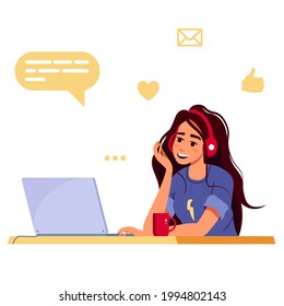 Modern young woman uses a laptop when working, studying, blogging, communication or programming. Work from home, freelancer, student. Concept of cute girl in a convenient workplace 