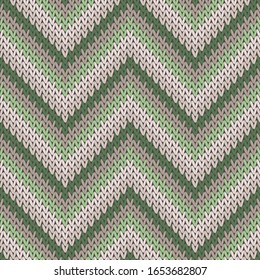 Modern zigzag chevron stripes christmas knit geometric seamless pattern. Scarf knitwear structure imitation. Classic warm seamless knitted pattern. Repeatable background.