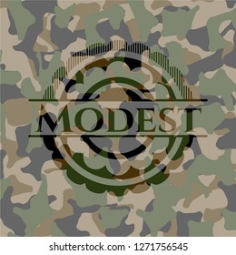 Modest written on a camo texture