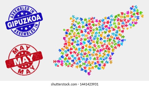 Module Gipuzkoa Province map and blue Assembled watermark, and May distress seal. Bright vector Gipuzkoa Province map mosaic of plug-in parts. Red round May seal.