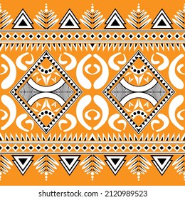 Moko tribal tatoo fabric pattern in yellow theme,Maori culture ethnic design in vector seamless pattern.