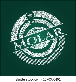 Molar written on a blackboard