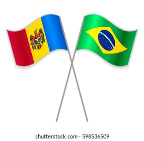 Moldovan and Brazilian crossed flags. Moldova combined with Brazil isolated on white. Language learning, international business or travel concept.