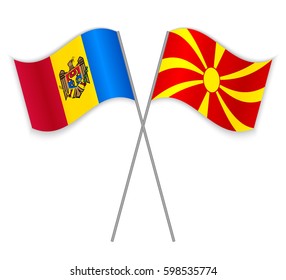 Moldovan and Macedonian crossed flags. Moldova combined with Macedonia isolated on white. Language learning, international business or travel concept.