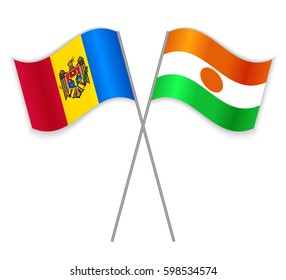 Moldovan and Nigerien crossed flags. Moldova combined with Niger isolated on white. Language learning, international business or travel concept.