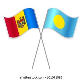 Moldovan and Palauan crossed flags. Moldova combined with Palau isolated on white. Language learning, international business or travel concept.
