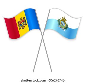 Moldovan and Sammarinese crossed flags. Moldova combined with San Marino isolated on white. Language learning, international business or travel concept.