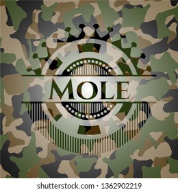 Mole on camouflage texture