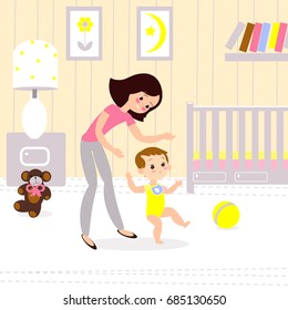 Mom and baby in the childrens room. The first seps of the child