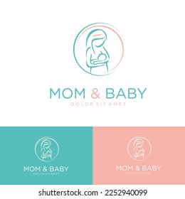 Mom and baby logo maternal woman holding a newborn baby in her arms vector illustration