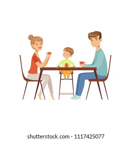 Mom, dad and their son sitting at the table and drinking tea, happy family and parenting concept vector Illustration on a white background
