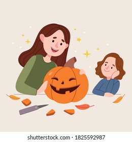 Mom and daughter make a pumpkin for Halloween.Make jack o lantern for halloween together.Autumn mystery. Halloween decoration concept. 