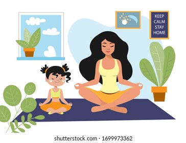 Mom with her daughter practices yoga on a flat. Mother's day concept. A family. Quarantine Concept