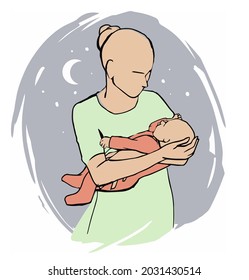 mom holds the baby in her arms and puts her to sleep