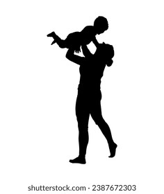 Mom playing and lifting her baby son up overhead silhouette.	