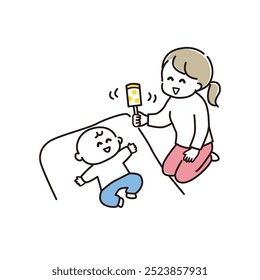 Mamãe acalma o bebê com um chocalho.