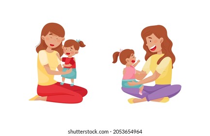 Mom with toddler baby set. Happy young mothers sitting on floor and playing with their kids cartoon vector illustration