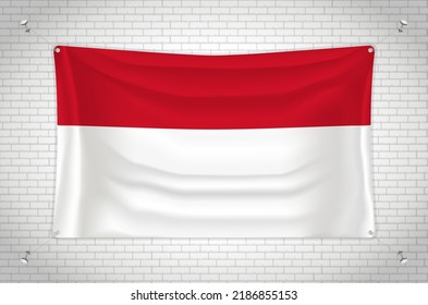 Bandera de Mónaco colgada en la pared de ladrillos. Dibujo 3D. Bandera pegada a la pared. Dibujar cuidadosamente en grupos en capas separadas para facilitar la edición.