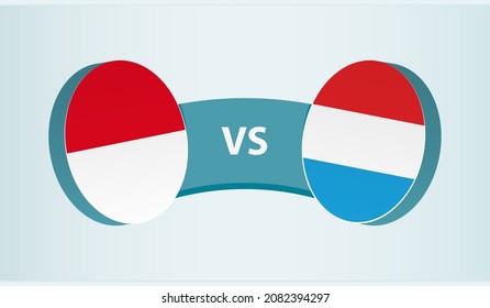 Monaco versus Luxembourg, team sports competition concept. Round flag of countries.