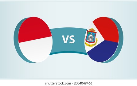 Monaco versus Sint Maarten, team sports competition concept. Round flag of countries.