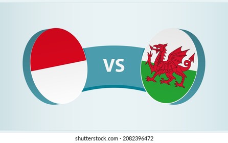 Monaco versus Wales, team sports competition concept. Round flag of countries.