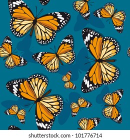 Monarch butterflies on blue background