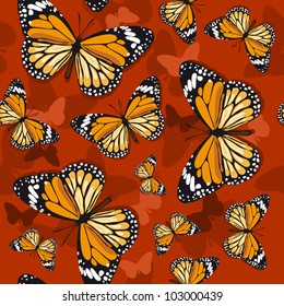 Monarch butterflies on red background