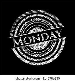 Monday chalkboard emblem written on a blackboard