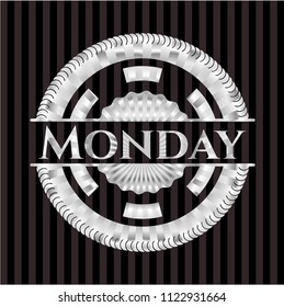 Monday silvery emblem or badge
