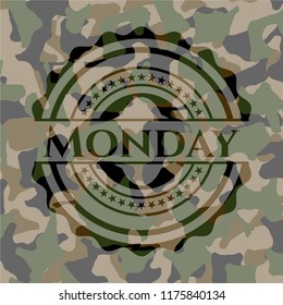 Monday written on a camouflage texture