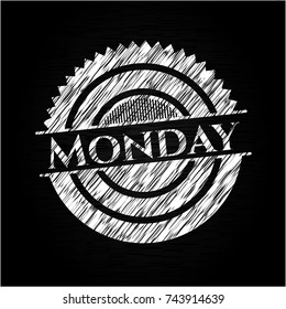 Monday written on a chalkboard