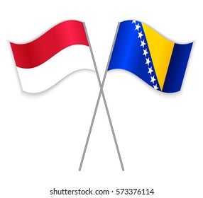 Monegasque and Bosnian crossed flags. Monaco combined with Bosnia and Herzegovina isolated on white. Language learning, international business or travel concept.