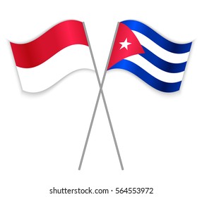 Monegasque and Cuban crossed flags. Monaco combined with Cuba isolated on white. Language learning, international business or travel concept.