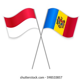 Monegasque and Moldovan crossed flags. Monaco combined with Moldova isolated on white. Language learning, international business or travel concept.