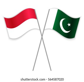 Monegasque and Pakistani crossed flags. Monaco combined with Pakistan isolated on white. Language learning, international business or travel concept.