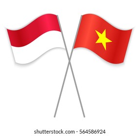 Monegasque and Vietnamese crossed flags. Monaco combined with Vietnam isolated on white. Language learning, international business or travel concept.