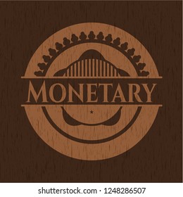 Monetary badge with wood background