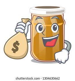 With money bag almond butter in a character jar