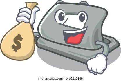 With money bag hole puncher on the mascot table