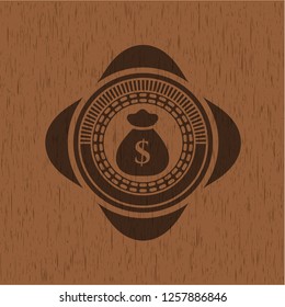 money bag icon inside vintage wooden emblem